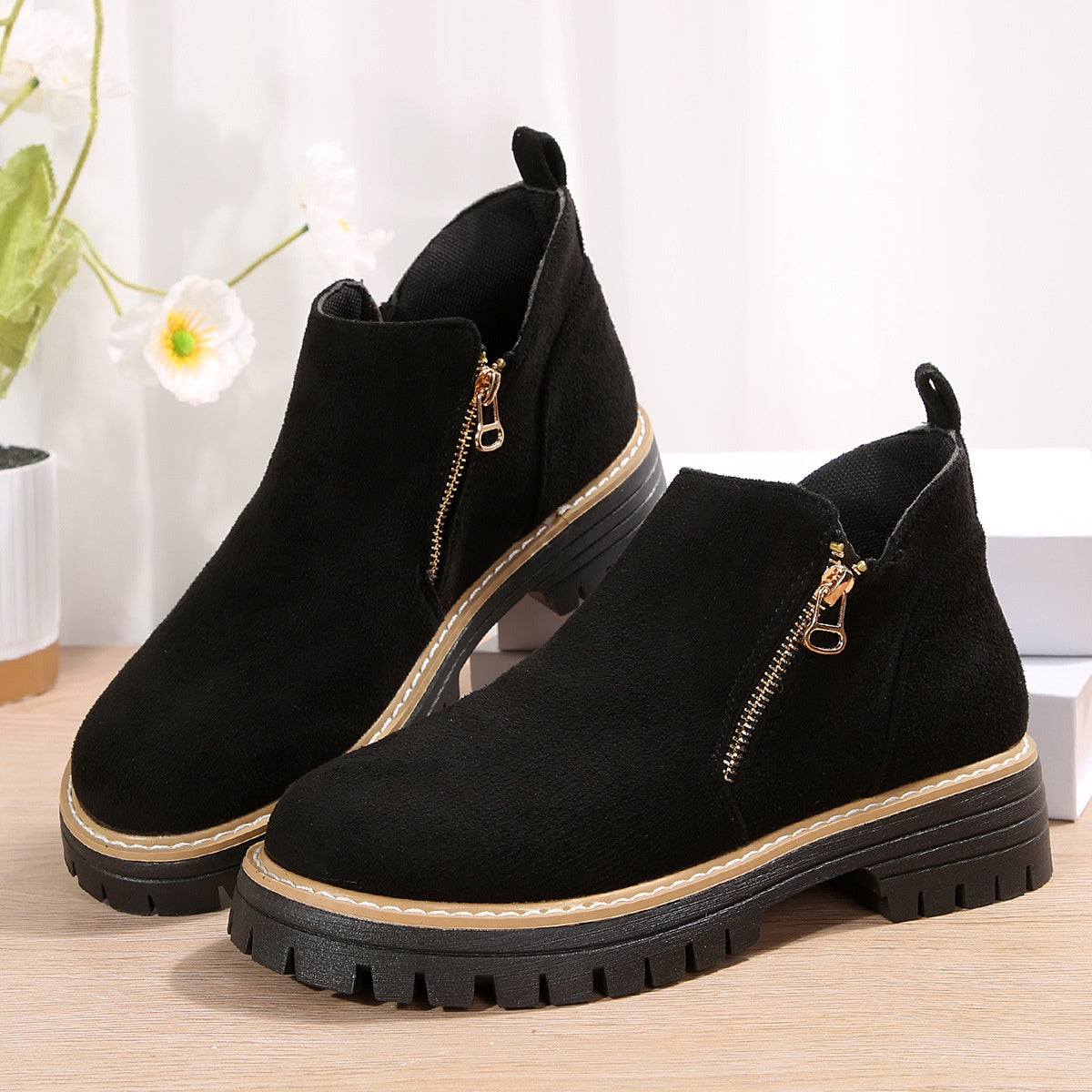 Bottines à fermeture zippée et semelle crantée élégante