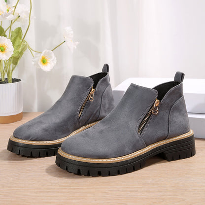 Bottines à fermeture zippée et semelle crantée élégante
